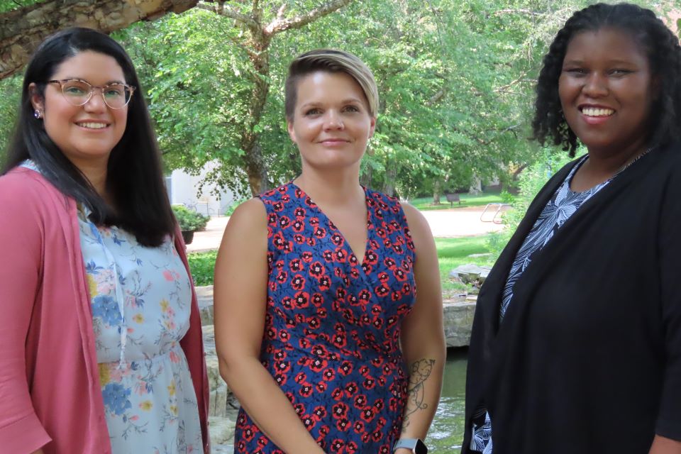 Dr. Heiden-Rootes, Annie Garner, and Alicia Barnesside by side 