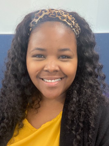 Headshot of woman with headband