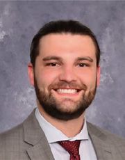 Headshot of Clayton Caulkins